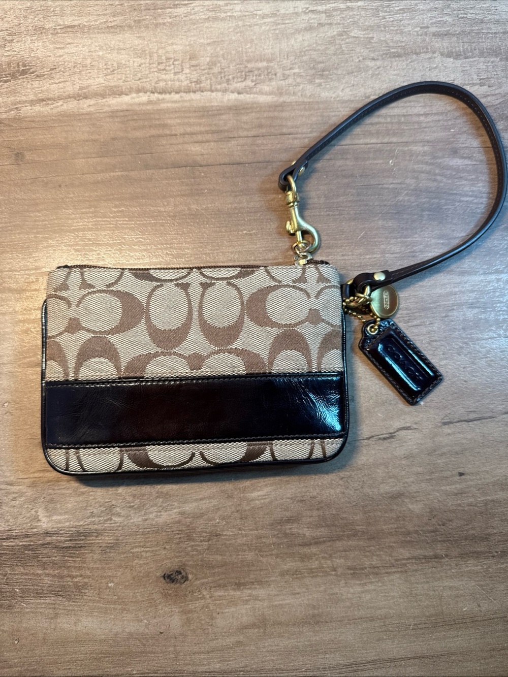 Coach Beige Signature Canvas Wristlet with Black Leather Trim